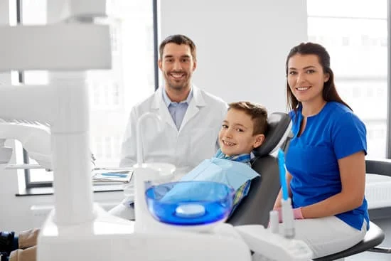 Dental clinic setup with the Dentist, dental assistant and a child patient