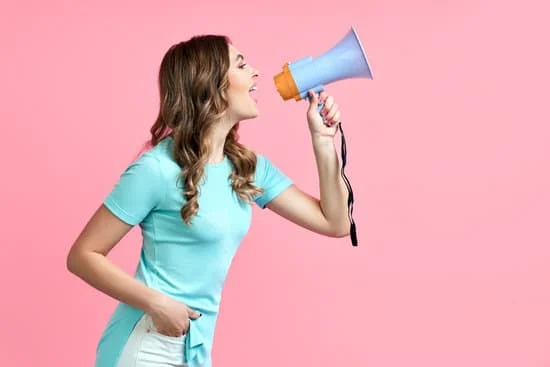 Girl speaking into a loudspeaker. Capturing Attention by tapping the visual sensory receptors is one of the top advantages of uploading videos and images to Google Business Profile